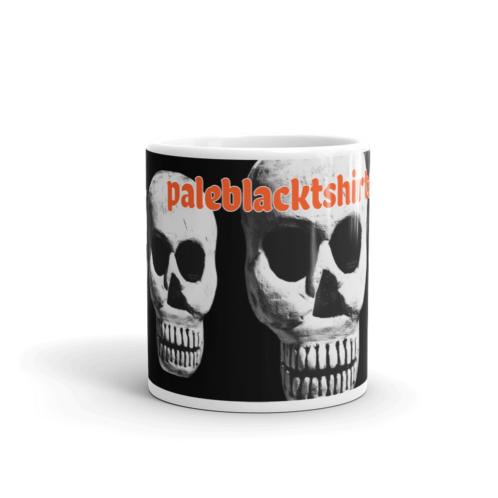 Coffee mug with four skulls and paleblacktshirts.com.